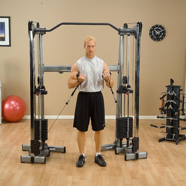 guy using body solid functional trainer gym pros